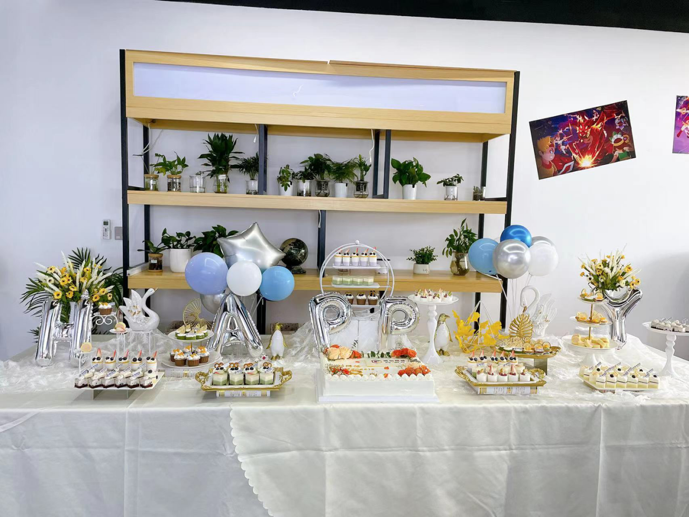 Joy Genesis office celebration scene